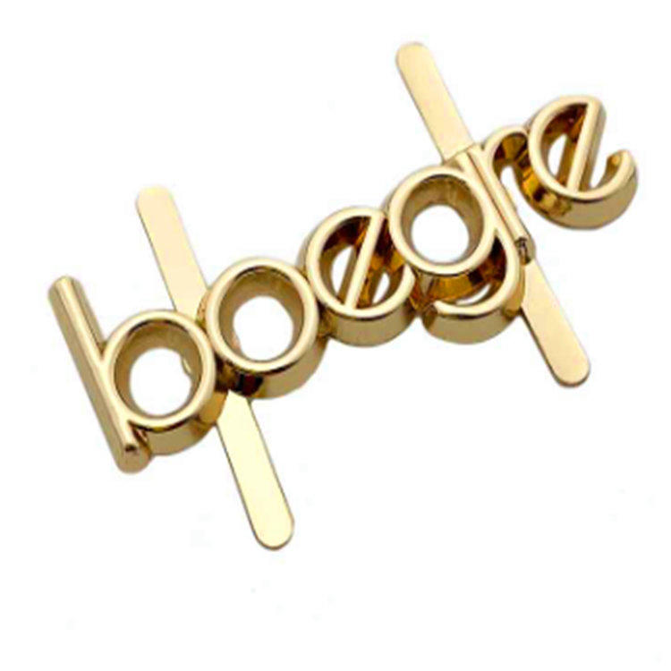 Zlaté prispôsobené logo písmena na hrote na zadnej kovovej doske pre tašku